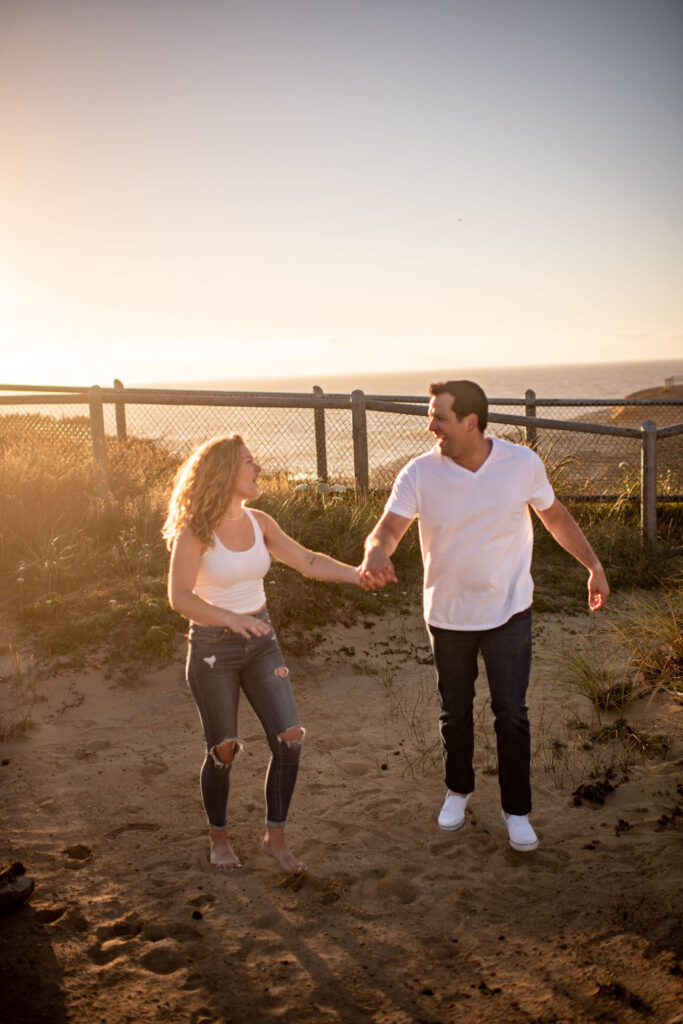 Couples golden hour beach photos in Pacific City, OR