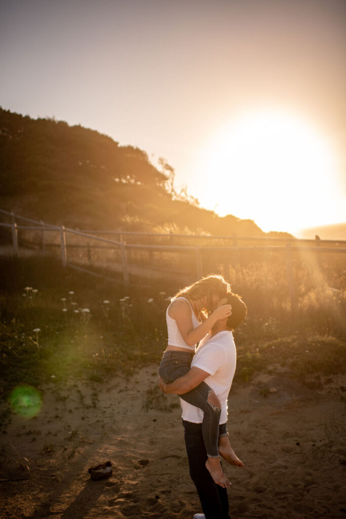 Couples golden hour beach photos in Pacific City, OR