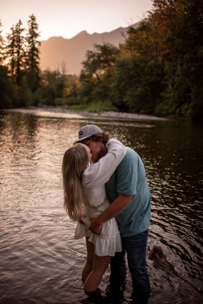Couple in the river during engagement session