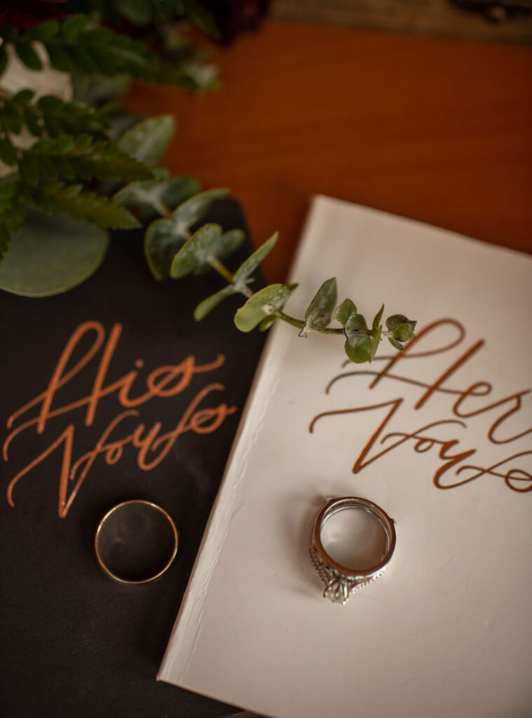 rings and his and her vows books flay lay photos

