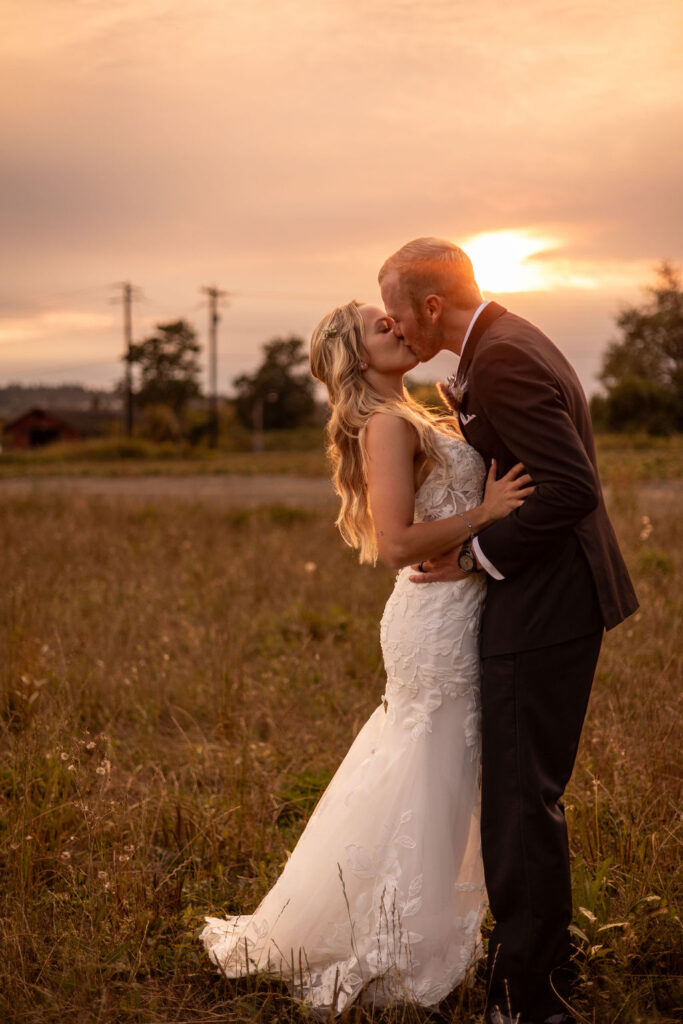bride and groom portrait during sunset at their fall wedding 