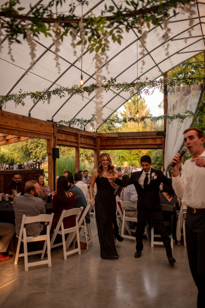 Guests dancing during a beautiful fall wedding day