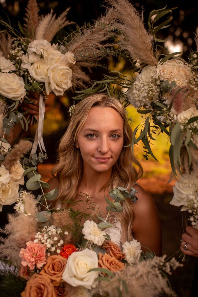 photo of the bride with flowers around her face